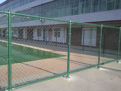 The PVC coated chain link fence is surrounding the water area in the factory.